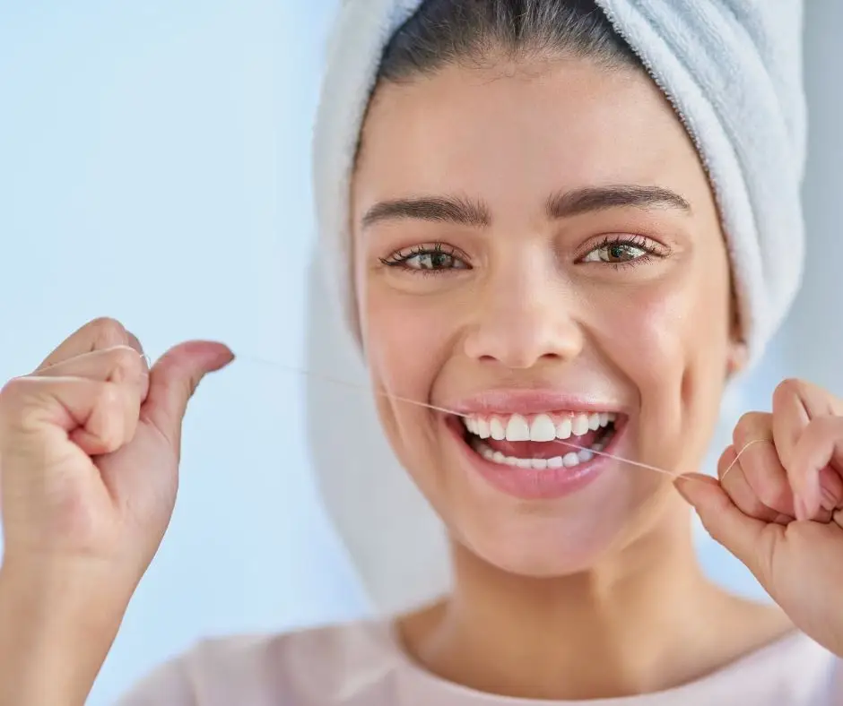 woman flossing