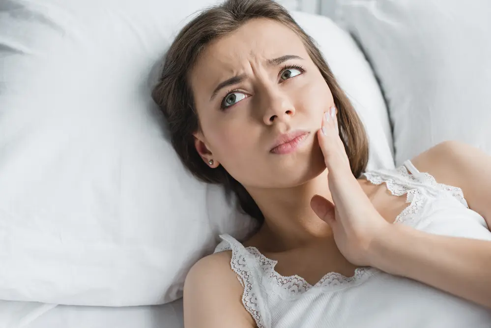 Woman with Jaw Pain